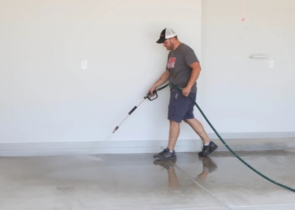 a man cleaning the floor